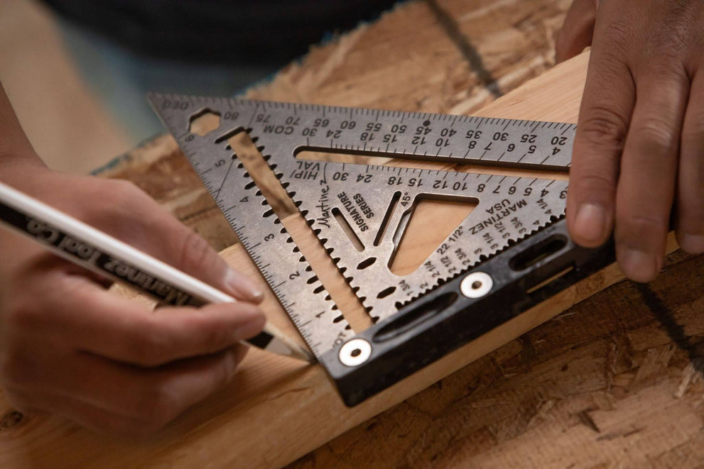 brick cutting layout with marked lines using speed square and protractor